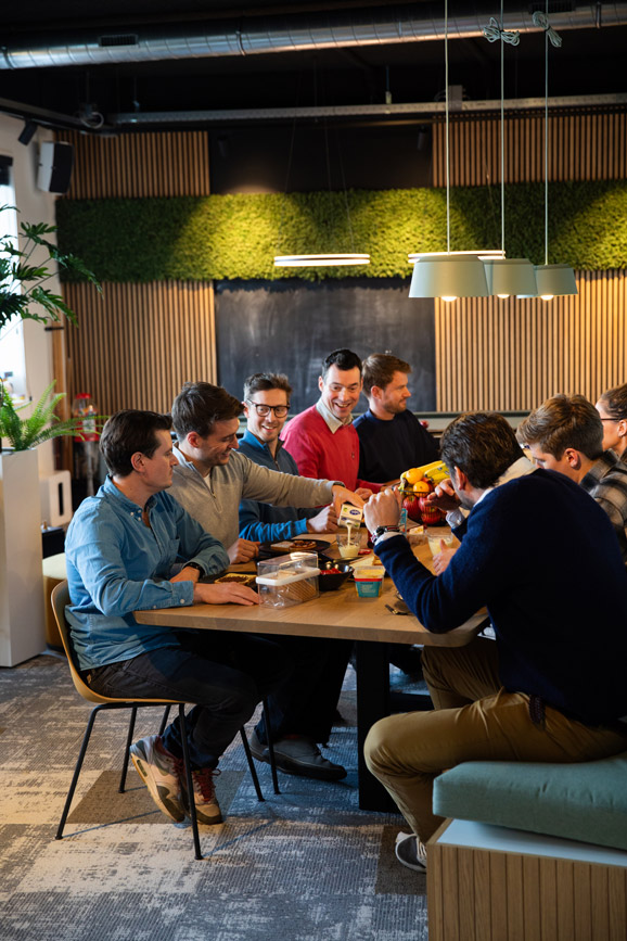 Infodation team talking in the office